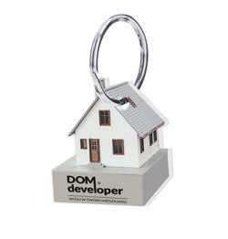 Brelok promujący developera budującego domy